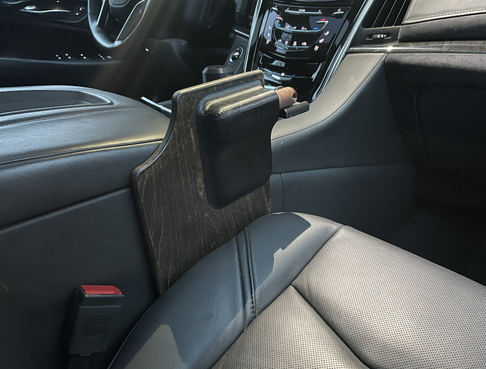 Folded Tray Table in Vehicle